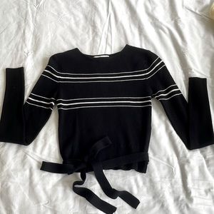Zara knit striped sweater, with tie detail in black. Size M woman’s.